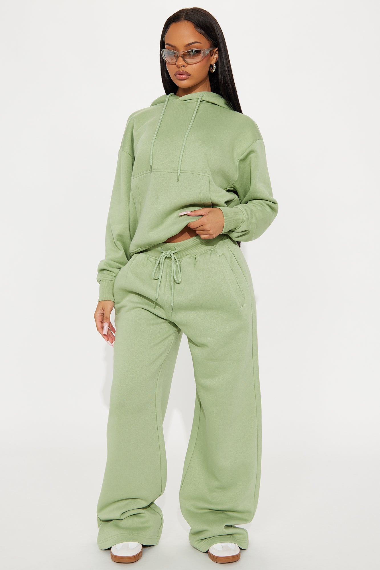 https://cdn.shopify.com/s/files/1/0293/9277/files/07-23-25_S5_44_123HOODIE_Sage_TK_SS_15-25-05_26670_PXF.jpg?v=1753380787