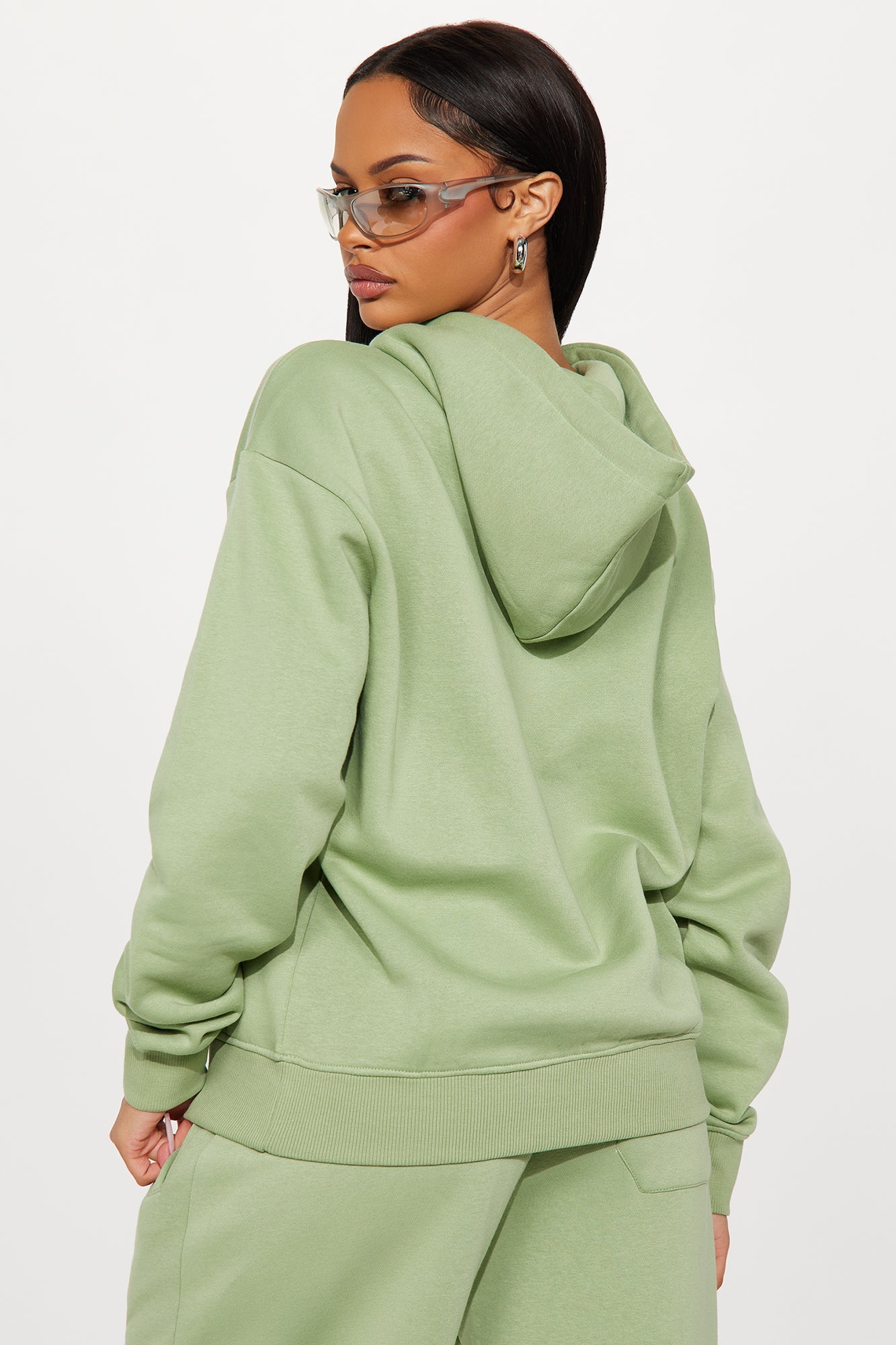 https://cdn.shopify.com/s/files/1/0293/9277/files/07-23-25_S5_44_123HOODIE_Sage_TK_SS_15-27-34_26691_PXF.jpg?v=1753380776
