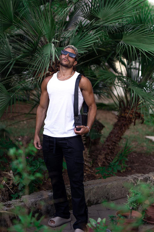 https://cdn.shopify.com/s/files/1/0293/9277/products/EssentialTankTop-White_mer.jpg?v=1669418546