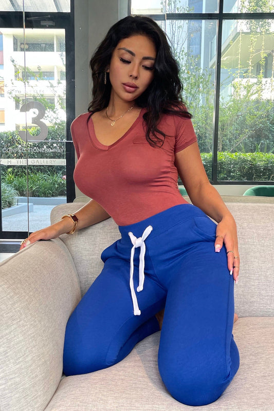 https://cdn.shopify.com/s/files/1/0293/9277/products/RelaxedVibeJoggers-Blue_MER_1ea3e803-8075-4a21-ad91-63afea91575a.jpg?v=1651873480