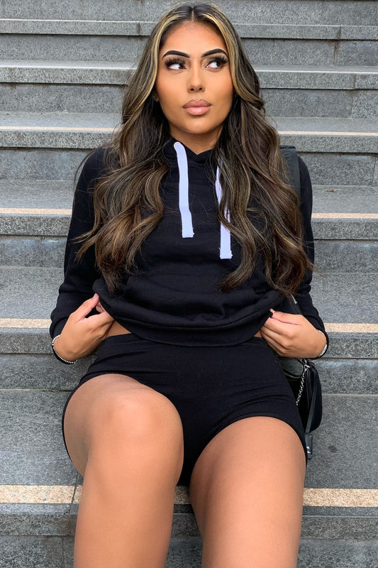 https://cdn.shopify.com/s/files/1/0293/9277/products/RelaxedVibeSolidHoodie-Black_MER.jpg?v=1629233645